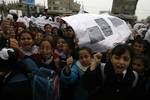 Palestinian girls schools students gather as they protest in the Rafah, southern Gaza Strip on March 03, 2012, Five days following violence in the flashpoint Al-Aqsa mosque compound in Jerusalem's Old City, between Israeli forces and Palestinians. The unrest is believed to have been fuelled by web postings by Israeli rightists urging Jews to visit the mosque compound and assert Israeli sovereignty over the site, one of the most sensitive in the Middle East. Know to Muslims as Al-Haram Al-Sharif