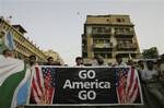 Supporters of the Pakistani religious party Jamaat-e-Islami, listen to their leaders during a rally to condemn the killing of al-Qaida leader Osama bin Laden and U. S. for violating Pakistan's sovereignty in an operation to kill Bin Laden, in Karachi, Pakistan on Friday, May 6, 2011.