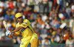 Chennai Super Kings' Mahendra Singh Dhoni prepares to bat during an Indian Premier League cricket match between Kings XI Punjab and Chennai Super Kings in Mohali, India, Wednesday, April 13, 2011.