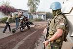 Uruguayan troops of the UN Organization Stabilization Mission in the Democratic Republic of the Congo (MONUSCO) patrol the streets of Goma in armored vehicles to protect residents of the city, which is under threat from the rebel group known as M23, 13 July, 2012.