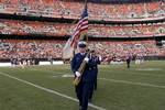 CLEVELAND - District Nine Coast Guardsmen perform in a color guard ceremony on November 11, 2006 during a Veteran's Day salute at halftime at a Cleveland Browns football game. Photo by Seamen Angela Henderson. (123342) ( COLORGUARD AT BROWN'S GAME (FOR RELEASE) )