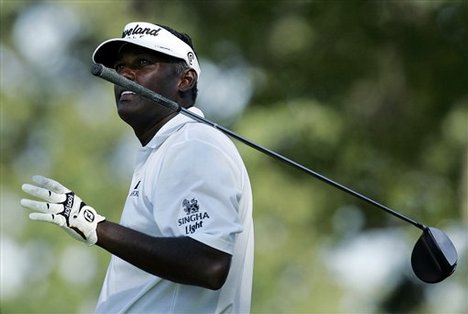 Vijay Singh of Fiji, reacts to his tee shot on the 13th hole during the first round golf at The Barclays golf tournament Thursday, Aug. 21, 2008, at Ridgewood Country Club in Paramus, N.J