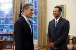 President Barack Obama greets professional golfer Tiger Woods in the Oval Office Monday, April 20, 2009. The 14-time major winner visited the White House Monday following a press conference for the AT&T National, the PGA Tour event Woods hosts at Congressional Country Club June 29-July 5.