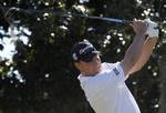 Roland Thatcher watches his tee shot on the first hole during the final round of the Children's Miracle Network Classic PGA golf tournament in Lake Buena Vista, Fla., Sunday, Nov. 14, 2010.