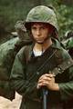 Da Nang, Vietnam - A young Marine private waits on the beach during the Marine landing. - August 3, 1965