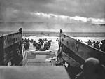 A LCVP (Landing Craft, Vehicle, Personnel) from the U.S. Coast Guard-manned USS Samuel Chase disembarks troops of the U.S. Army's First Division on the morning of June 6, 1944 (D-Day) at Omaha Beach, France.