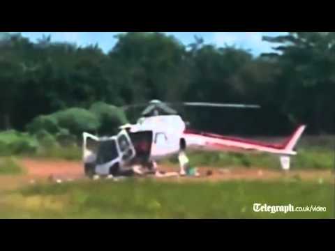 Helicopter falls apart on landing