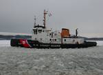 NEW YORK, NY. (Feb. 3, 2004)--The Coast Guard Cutter Penebscot Bay, from Bayonne, NJ, breaks ice in the Hudson River near Albany. Coast Guard ice breakers have been called into the tri state area from as far away as North Carolina to assist with ice breaking due to the frigid winter weather. USCG photo by PA1 Tom Sperduto (94477) ( ICE BREAKING OPS )