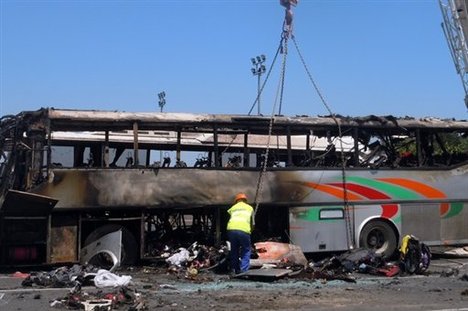 This image provided by the Bulgarian Interior Ministry Thursday July 19, 2012, shows a damaged bus following Wednesday's deadly suicide attack on a bus full of Israeli vacationers at the Burgas airport parking lot, Burgas, Bulgaria.