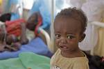 A malnourished child cries at a field hospital of the International Rescue Committee, IRC, in Dadaab, Kenya, Wednesday, Aug. 3, 2011.