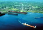 Two Harbors, Minnesota, on the north shore of Lake Superior. A Great lakes freighter is departing the harbor.