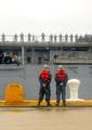 Sailors assigned to the amphibious dock landing ship USS Oak Hill (LSD 51) man the rails as the ship returns to homeport after a three-month deployment in the Caribbean.