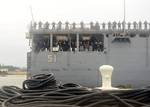 Sailors assigned to the amphibious dock landing ship USS Oak Hill (LSD 51) man the rails as the ship returns to homeport after a three-month deployment in the Caribbean.