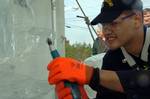 FORT LEE, Va. - Coast Guard Petty Officer 1st Class James Swenson, Food Service Quality Assurance Manager at the Coast Guard Academy in New London, Conn., uses a power drill to carve an Ice sculpture at the 32nd Annual U.S. Army Culinary Arts Competition in Fort Lee, Va., March 14, 2007. Swenson, a food service specialist in the Coast Guard, a member of the Coast Guard team competed against chefs representing the Army, Air Force and the Marine Corps. (U.S. Coast Guard photo by Petty Officer 2nd