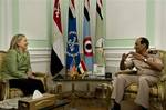 US Secretary of State Hillary Rodham Clinton listens to Field Marshal Hussein Tantawi before a meeting at the Ministry of Defense July 15, 2012 in Cairo, Egypt.