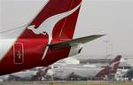 A Qantas passenger aircraft taxis along the runway as it prepares for take-off at Sydney Airport, Tuesday, May 8, 2007. A 10.8 billion Australian dollar (US$8.9 billion; Euro6.55 billion) takeover bid for one of the world's most recognizable airlines, Qantas, finally collapsed on Tuesday, pulling the company's share price sharply down. Shareholders, believed to include international hedge funds that stockpiled Qantas shares recently in hopes of making quick profits on the takeover, dumped the co