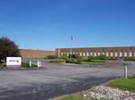 Former manufacturing facility in Henrietta, New York, constructed in the 1960s and sold to Harris RF Communications in 2010.