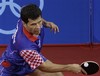 Croatia's Zoran Primorac returns against Sweden's Jorgen Persson during their men's table tennis quarterfinal match at the Beijing 2008 Olympics in Beijing, Friday, Aug. 22, 2008. Persson won the match.