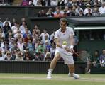 Andy Murray of Britain during a quarterfinals match against David Ferrer of Spain at the All England Lawn Tennis Championships at Wimbledon, England, Wednesday July 4, 2012.