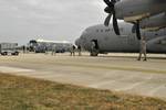 U. S. Airmen with the 48th Aircraft Maintenance Squadron arrive at RAF Lakenheath in England May 11, 2011, after returning from Aviano Air Base, Italy, in support of Operation Unified Protector, a NATO-led mission to operate a no-fly zone over the nation of Libya.