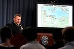 In this picture provided by the Department of Defense, Vice Adm. William E. Gortney, Director of the Joint Staff, gives a news conference at the Pentagon on Saturday, March 19, 2011. The Pentagon says U.S. and British ships and submarines have launched the first phase of a missile assault on Libyan air defenses, firing 112 Tomahawk cruise missiles at more than 20 targets along the coast. Saturday's mission was aimed at clearing the way for imposition of a European-led no-fly zone over the North