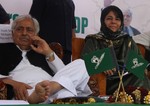 Jammu and Kashmir People�s Democratic Party (PDP) party president Mehbooba Mufti with  party patron and former J&K chief Minister Mufti Mohammad Sayeed look on the  13th foundation Anniversary that was observed today at SRTC ground in Srinagar on Monday India, 30, July 2012 .