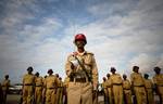 SOMALIA, Mogadishu: In a handout photograph released by the African Union-United Nations Information Support Team 19 August, a Somali guard of honour stands in line up at Aden Abdulle International Airport ahead of the arrival of the Turkish Prime Minister Recep Tayyip Erdogan on an official visit to Somalia. AU-UN IST PHOTO / STUART PRICE.