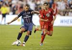 Paris Saint-Germain forward Zlatan Ibrahimovic (18) dribbles the ball against during the first half of an international friendly soccer game in the World Football Challenge, Saturday, July 28, 2012, in Washington.