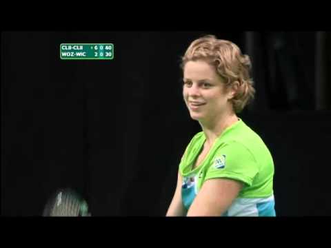 Kim Clijsters threatens to shove a ball down Caroline's Wozniacki throat