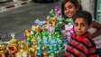 Dalya and her brother by her stall, selling lanterns, or fawanees, in Gaza's old quarter