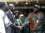  Joseph Kony, leader of Uganda&acute;s Lord&acute;s Resistance Army, right, greets members of a delegation of Ugandan officials and lawmakers and representatives from non-governmental organizations, Monday, July 31, 2006 in the Democratic Republic of Cong