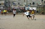 Palestinian youths playing football during a local match a little before sunset in Rafah refugee camp in the southern Gaza Strip on July 28, 2012. Palestinians organize Ramadan Olympics in conjunction with the ongoing Olympic Games in London, while Muslims around the world abstain from food, drink and sex from sunrise to sunset during Ramadan the holiest month in the Islamic calendar.Photo by Ahmed Deeb / WN