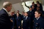 The U.S. Coast Guard Academy Glee Club sings Christmas carols Friday, Dec. 10, 2010, in the home of Adm. J. Scott Burhoe in New London, Conn. As superintendent of the academy, Burhoe and his wife Betsy hosted several holiday gatherings in their home, known as Quarters One, on the academy campus. U.S. Coast Guard photograph by Petty Officer 1st Class NyxoLyno Cangemi (1084405) ( Holidays at Coast Guard Academy Quarters One )