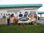 Hafa Adai and greetings from where America's day begins! NOAA's Weather Forecast Office in Guam is the only National Weather Service Office west of the International Date Line. It has an area of responsibility larger than the entire continental U.S. with just 12 surface observation points and two radars. Guam's area also has twice as many tropical cyclones as the Atlantic in a typical year. Quite a culturally diverse office, this photo represents Chamorro, Samoan, Filipino, and Chinese, as well