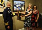 NEW YORK - Vice Adm. Sally Brice-O'Hara, Vice Commandant of the U.S. Coast Guard, (left), and Claudia Seymour, president of the Salmagundi Club, present the George Gray Award for Artistic Excellence to a painting by Coast Guard artist (and absentee winner) Robert Semler as independent juror Carol Kino looks on. The presentation was made during the Coast Guard Art Program 2011 Collection Acceptance Ceremony at the Salmagundi Club, Thursday, July 7, 2011. Vice Adm. Brice-O'Hara was invited to view