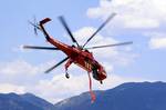 A firefighting S-64E Sikorsky Sky-Crane heads back to the front lines of the Waldo Canyon fire after taking on a load of slurry at the U.S. Air Force Academy's airfield June 28, 2012 in Colorado Springs, Colo. All firefighting helicopter operations are being staged out of the Academys airfield. As of June 29th, the Waldo Canyon fire is 30% contained. (U.S. Air Force photo/Mike Kaplan)