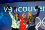 The Medal Ceremony at Whistler on Day 9 of the Vancouver 2010 Winter Olympics. From left to right: Tina Maze of Slovenia (silver), Andrea Fischbacher of Austria (gold) and Lindsey Vonn of the United States (bronze) with the medals they earned in women's Super-G in alpine skiing.