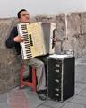 Accordion player in a street in the historic centre of Quito