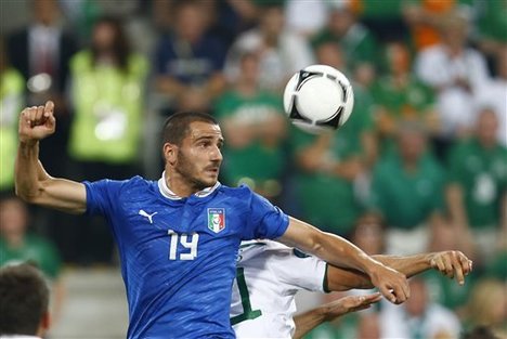 Italy's Leonardo Bonucci heads the ball during the Euro 2012 soccer championship Group C match between Italy and the Republic of Ireland in Poznan, Poland, Monday, June 18, 2012.