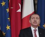 Turkish Prime Minister Recep Tayyip Erdogan attends a press conference at the end of his meeting with Italian Premier Mario Monti at Villa Madama in Rome