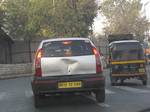 The car Tata Indica running on the city road - automobile - India