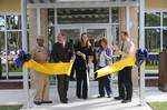 VIPs cut the ribbon at a new youth center at Naval Support Activity Panama City.