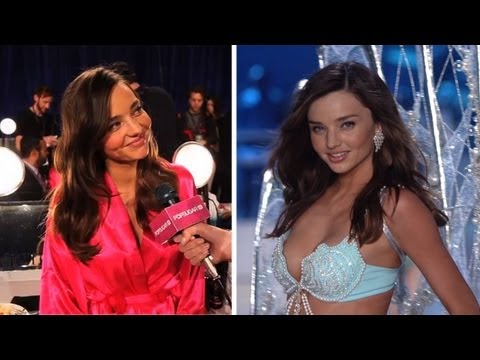 Miranda Kerr Waves at Orlando Bloom on VIctoria's Secret Runway