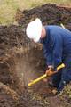 POINT HOPE, Alaska Chief Petty Officer James Brumley, a resident of Crossett, Ark., uses a pick-axe to remove permafrost inside a hole where a 15-foot Coast Guard Aid to Navigation tower will be placed four miles south of Point Hope Friday, July 30, 2010. Brumley was part of a team of four from Aids to Navigation Team Kodiak who built the northern most Coast Guard Aids to Navigation Tower in the United States. Coast Guard photo by Petty Officer 3rd Class Walter Shinn. (960086) ( ANT Kodiak Point