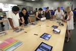 Customers are seen in an Apple store in Carugate, near Milan, Italy, Thursday, Aug. 25, 2011. Steve Jobs resigned as Apple CEO on Wednesday, saying he could no longer handle the job and would continue to play a leadership role as chairman of the board. Since Steve Jobs' return to Apple Inc. in 1997 as CEO, the company has been on an unparalleled upswing, highlighted by the immense popularity of the iPad and iPhone. Now, with Jobs no longer leading, Apple will have to prove it can keep its moment