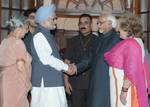 The Prime Minister, Dr. Manmohan Singh congratulating the Vice President-elect, Shri Mohd. Hamid Ansari, in New Delhi on August 07, 2012. Smt. Gursharan Kaur and Smt. Salma Ansari are also seen.