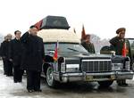 North Korea's next leader, Kim Jong Un, front left, salutes beside the hearse carrying the body of his late father and North Korean leader Kim Jong Il during the funeral procession in Pyongyang, North Korea Wednesday Dec. 28, 2011. Behind Kim Jong Un, in order are Jang Song Thaek, Kim Jong Il's brother-in-law and vice chairman of the National Defense Commission, and Workers Party officials Choe Thae Bok and Kim Ki Nam. At far right is Ri Yong Ho, the Vice Marshal of the Korean People’s Army, and