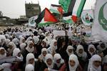 Palestinian girls schools students gather as they protest in the Rafah, southern Gaza Strip on March 03, 2012, Five days following violence in the flashpoint Al-Aqsa mosque compound in Jerusalem's Old City, between Israeli forces and Palestinians. The unrest is believed to have been fuelled by web postings by Israeli rightists urging Jews to visit the mosque compound and assert Israeli sovereignty over the site, one of the most sensitive in the Middle East. Know to Muslims as Al-Haram Al-Sharif