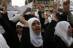 Palestinian girls schools students gather as they protest in the Rafah, southern Gaza Strip on March 03, 2012, Five days following violence in the flashpoint Al-Aqsa mosque compound in Jerusalem's Old City, between Israeli forces and Palestinians. The unrest is believed to have been fuelled by web postings by Israeli rightists urging Jews to visit the mosque compound and assert Israeli sovereignty over the site, one of the most sensitive in the Middle East. Know to Muslims as Al-Haram Al-Sharif