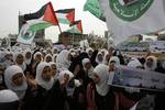 Palestinian girls schools students gather as they protest in the Rafah, southern Gaza Strip on March 03, 2012, Five days following violence in the flashpoint Al-Aqsa mosque compound in Jerusalem's Old City, between Israeli forces and Palestinians. The unrest is believed to have been fuelled by web postings by Israeli rightists urging Jews to visit the mosque compound and assert Israeli sovereignty over the site, one of the most sensitive in the Middle East. Know to Muslims as Al-Haram Al-Sharif